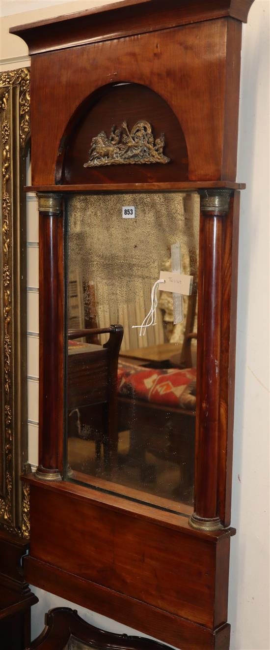 A French Empire flame mahogany pier glass, W.1ft 10in. H.3ft 10in.